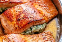 Decadent Garlic Butter Salmon Stuffed with Creamy Spinach