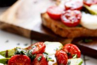 Zesty Caprese Crostini with Smoky Grilled Avocado