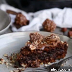 Ultimate Ferrero Rocher Skillet Brookie 12 Ferrero Rocher Deep Dish Skillet Brownie Cookie on a plate