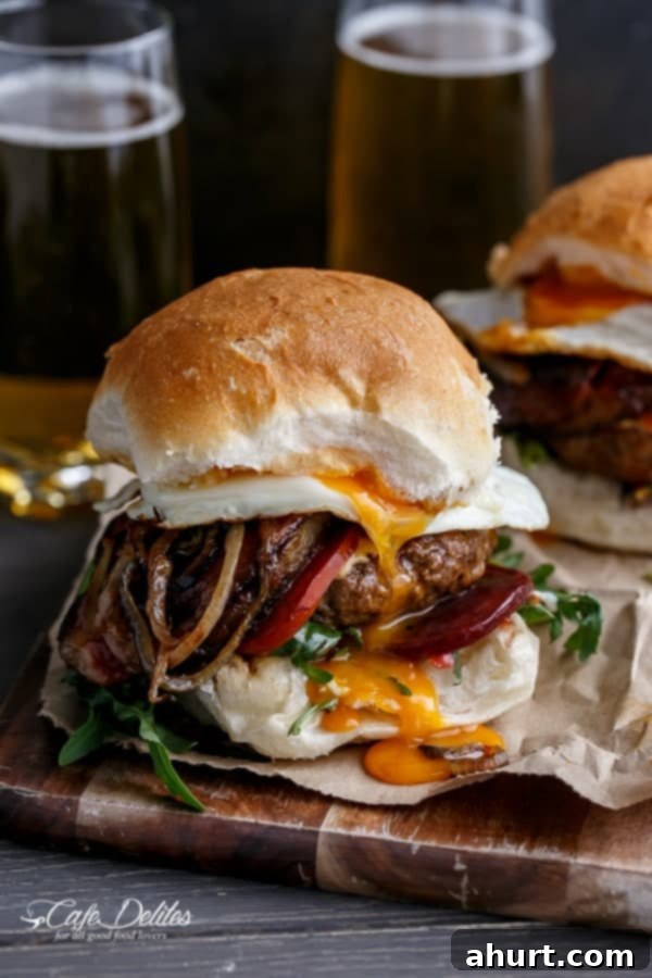 Outback Brewed Beef Burgers 2 Side view of Drunken Aussie Beef Burgers on plate