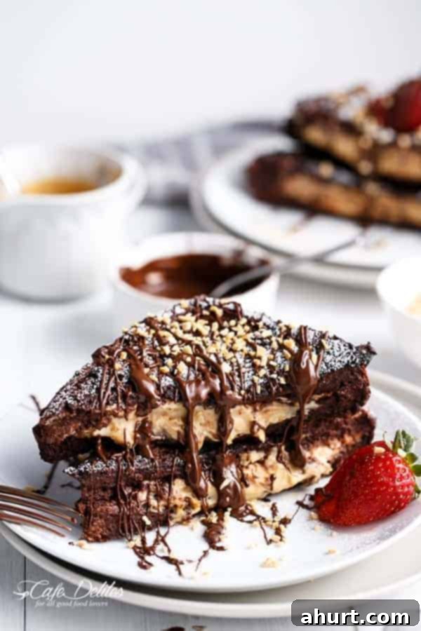 Chocolate brownie peanut butter cheesecake stuffed french toasts on a plate