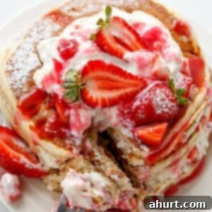 Strawberry Shortcake Greek Yogurt Flapjacks 7 Strawberry Shortcake Greek Yogurt Pancakes on a plate