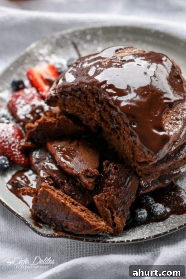 A piece taken out from Double Chocolate Brownie Pancakes