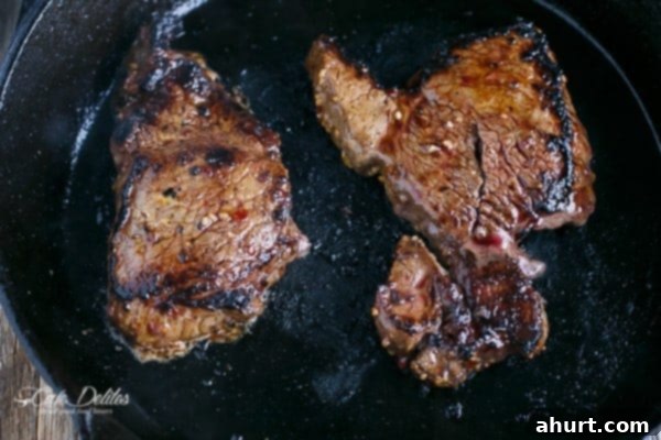 Sizzling Korean Bulgogi Beef strips cooking in a pan, preparing for tacos