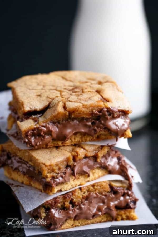 Gooey Nutella Stuffed Salted Caramel Blondies 6 Side view of Nutella Stuffed Salted Caramel Blondies