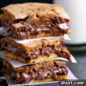 Gooey Nutella Stuffed Salted Caramel Blondies 10 Nutella Stuffed Salted Caramel Blondies stack on each other