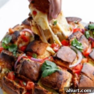 Savory Chipotle Carne Asada Pull Apart Loaf 11 Carne Asada Chipotle Pull Apart Bread on a plate