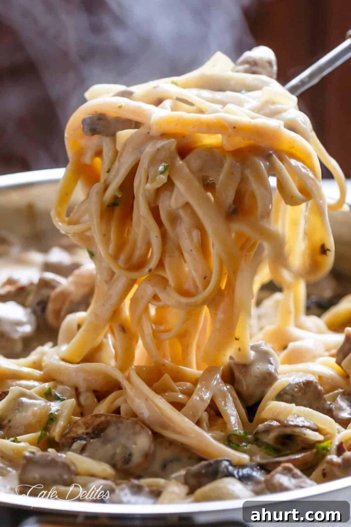 Velvety Beef Stroganoff with Earthy Mushrooms 10 A close-up shot of a bowl of creamy beef stroganoff, showing the rich sauce and tender beef, garnished with fresh herbs, ready to be enjoyed.