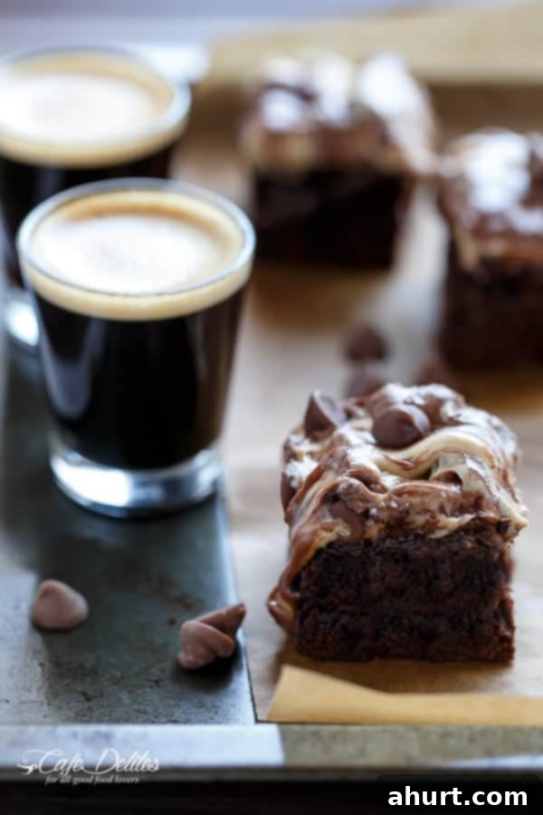 Swirled Mocha Cookie Dough Espresso Fudge Brownies 2 Espresso Fudge Brownies with Mocha Swirl Cookie Dough piece with black coffee