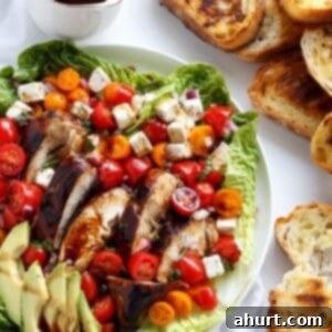Grilled Balsamic Chicken, Avocado & Bruschetta Greens 11 Grilled Balsamic Chicken and Avocado Bruschetta Salad on a plater
