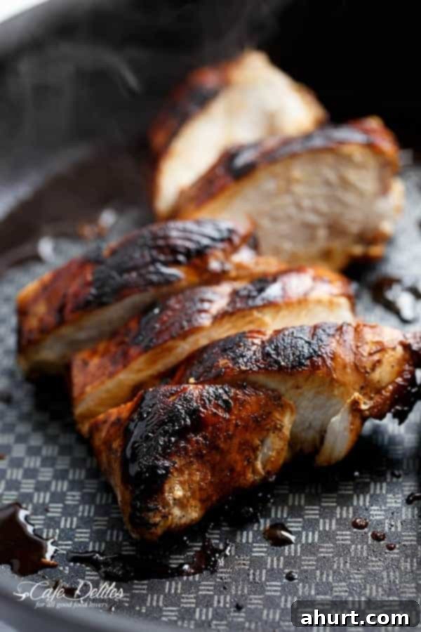 Grilled Balsamic Chicken piece on a tray