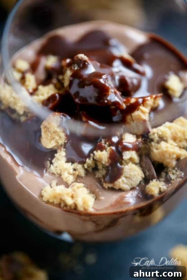 No Bake Nutella Chip Cookie Cheesecake Parfait 4 Nutella Cheesecake Chocolate Chip Cookie Parfait in a glass