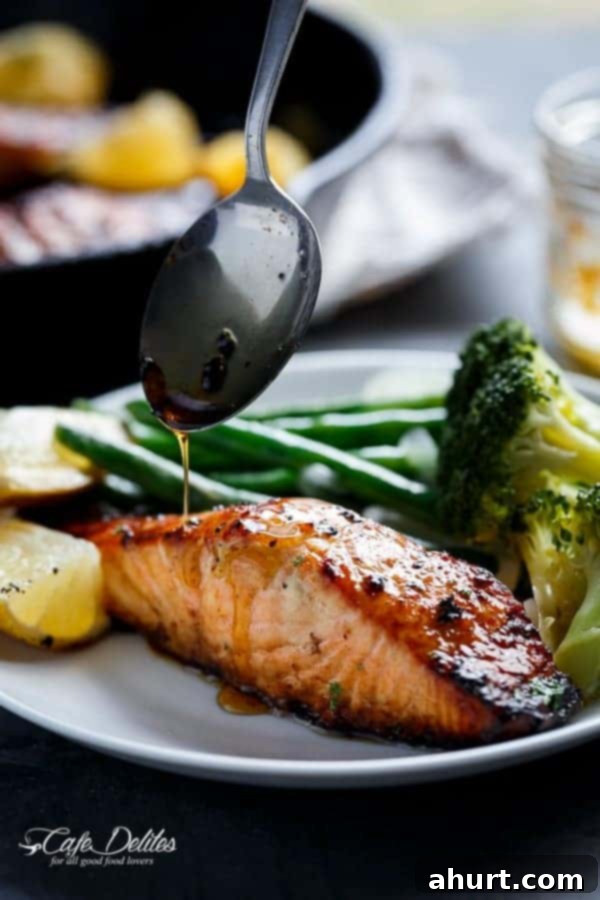 Honey Garlic Glazed Salmon with Browned Butter 5 Grilled Browned Butter Honey Garlic Salmon on a plate
