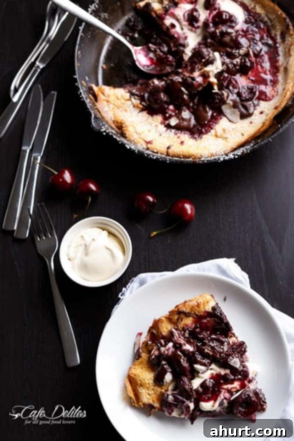 Toasted Butter Chocolate-Cherry Sky-High Pancake 7 Top view image of Chocolate-Cherry German Pancake (or Dutch Baby Pancake) in a bowl