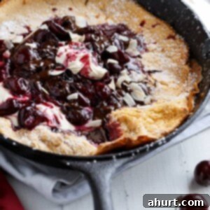 Toasted Butter Chocolate-Cherry Sky-High Pancake 9 Chocolate-Cherry Browned Butter German Pancake on a pan