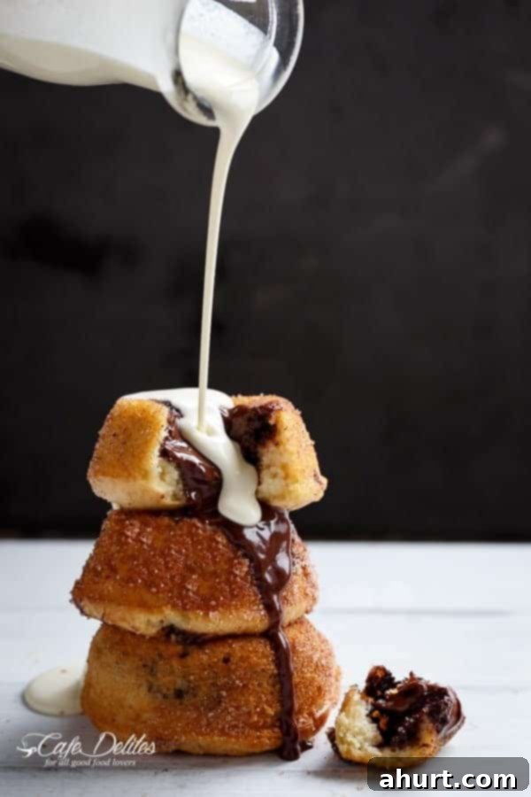 Golden Churro Molten Delights 2 White cream poured over Churro Lava Cakes