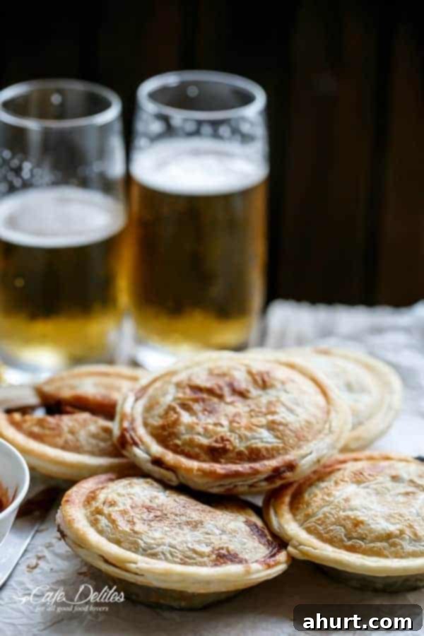Hearty Slow Cooker Steak and Gravy Pot Pies 3 Slow Cooker Steak and Gravy Pies, showing a close-up of the delicious filling