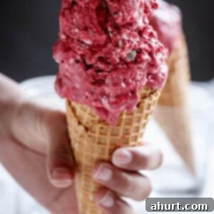 Decadent Red Velvet Cookie Dough Frozen Yogurt 11 Red Velvet Cookie Dough Frozen Yogurt on a cone