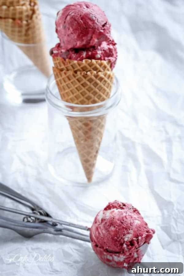 Decadent Red Velvet Cookie Dough Frozen Yogurt 7 Close-up of Red Velvet Cookie Dough Frozen Yogurt with a Vanilla Bean Cream Cheese Swirl, showing the beautiful marble effect.