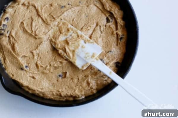 The creamy, thick batter for the Low Carb Browned Butter Chocolate Chip Skillet Cookie, ready to be baked.