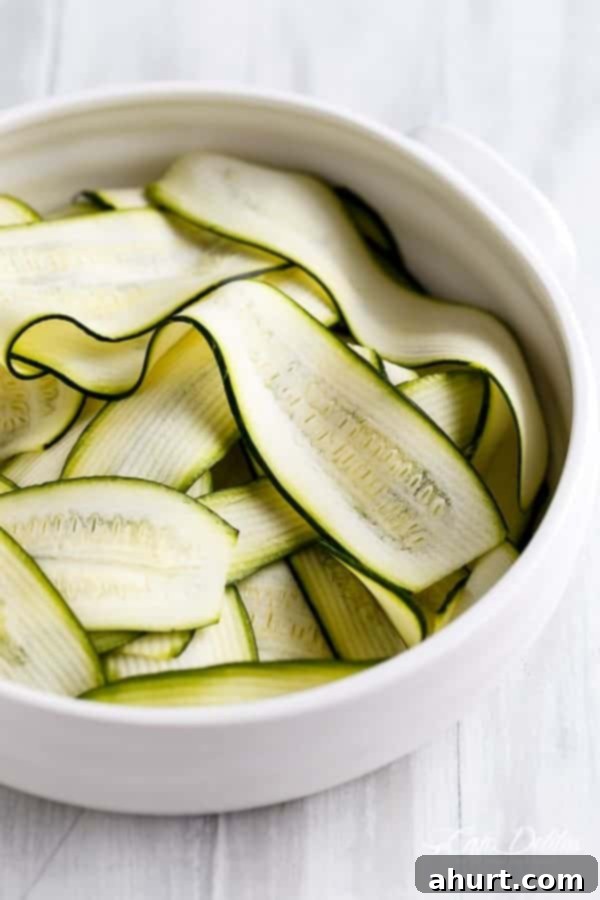 Raw Zucchini Cannelloni slices in a bowl