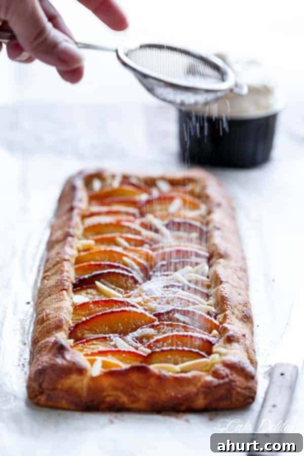 Low Carb Almond Peach Pie with Vanilla Bean Mascarpone Cream 7 Almond Peach Pie with Vanilla Bean Mascarpone Cream covered with parchment paper while baking.