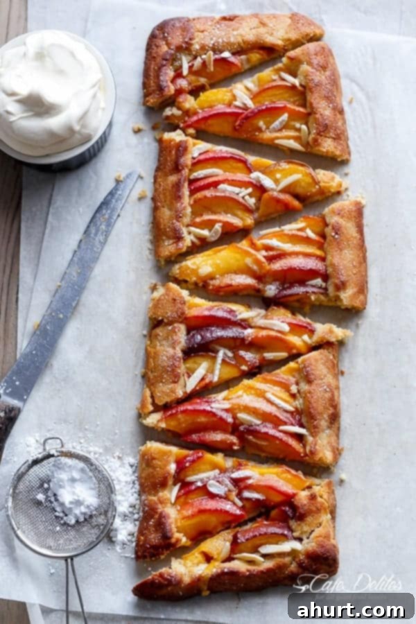 Low Carb Almond Peach Pie with Vanilla Bean Mascarpone Cream 8 Triangle pieces of Almond Peach Pie with Vanilla Bean Mascarpone Cream arranged on a baking tray.