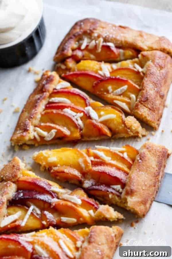 Low Carb Almond Peach Pie with Vanilla Bean Mascarpone Cream 9 Individual pieces of Almond Peach Pie with vanilla cream on top.