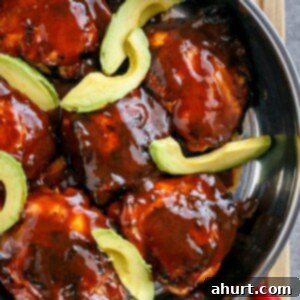 Tangy Barbecue Buffalo Chicken Thighs with Creamy Avocado 7 Crispy Barbecue Buffalo Chicken Thighs with Avocado in a pan, ready to be served
