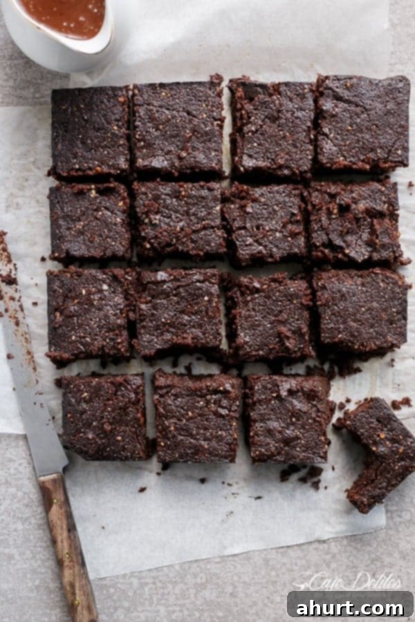 Decadent Low Carb Flourless Hazelnut Brownies 6 A serving of Fudgy Flourless Hazelnut Brownies drizzled with Hot Chocolate Fudge Sauce