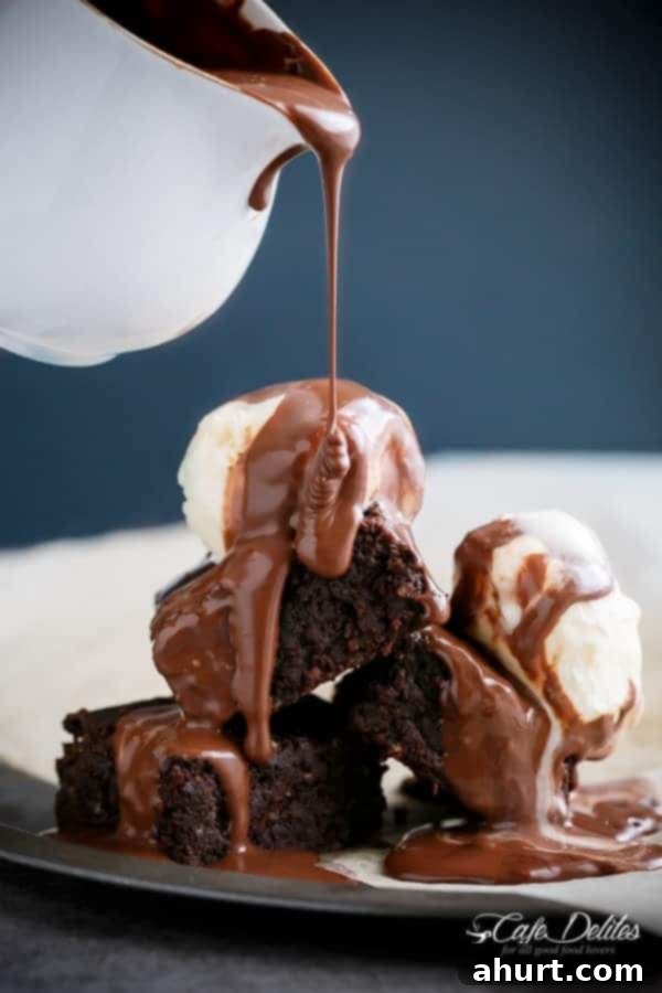 Decadent Low Carb Flourless Hazelnut Brownies 8 A stack of Fudgy Flourless Hazelnut Brownies, showcasing their dense texture