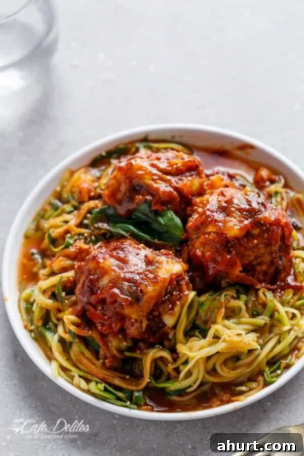 Sun Dried Tomato Cheesy Meatballs with some spaghetti
