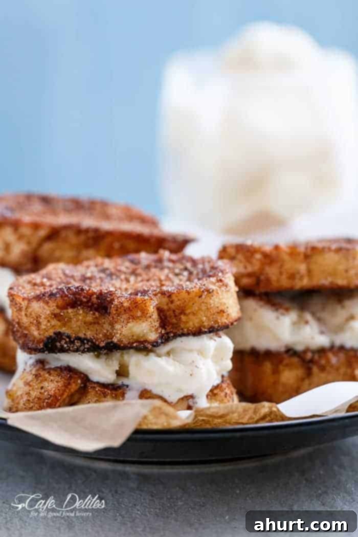 Decadent Churro French Toast Ice Cream Sandwich 7 Finished Crispy, buttery Churro French Toast Ice Cream Sandwiches, ready to be enjoyed as a decadent breakfast or dessert.