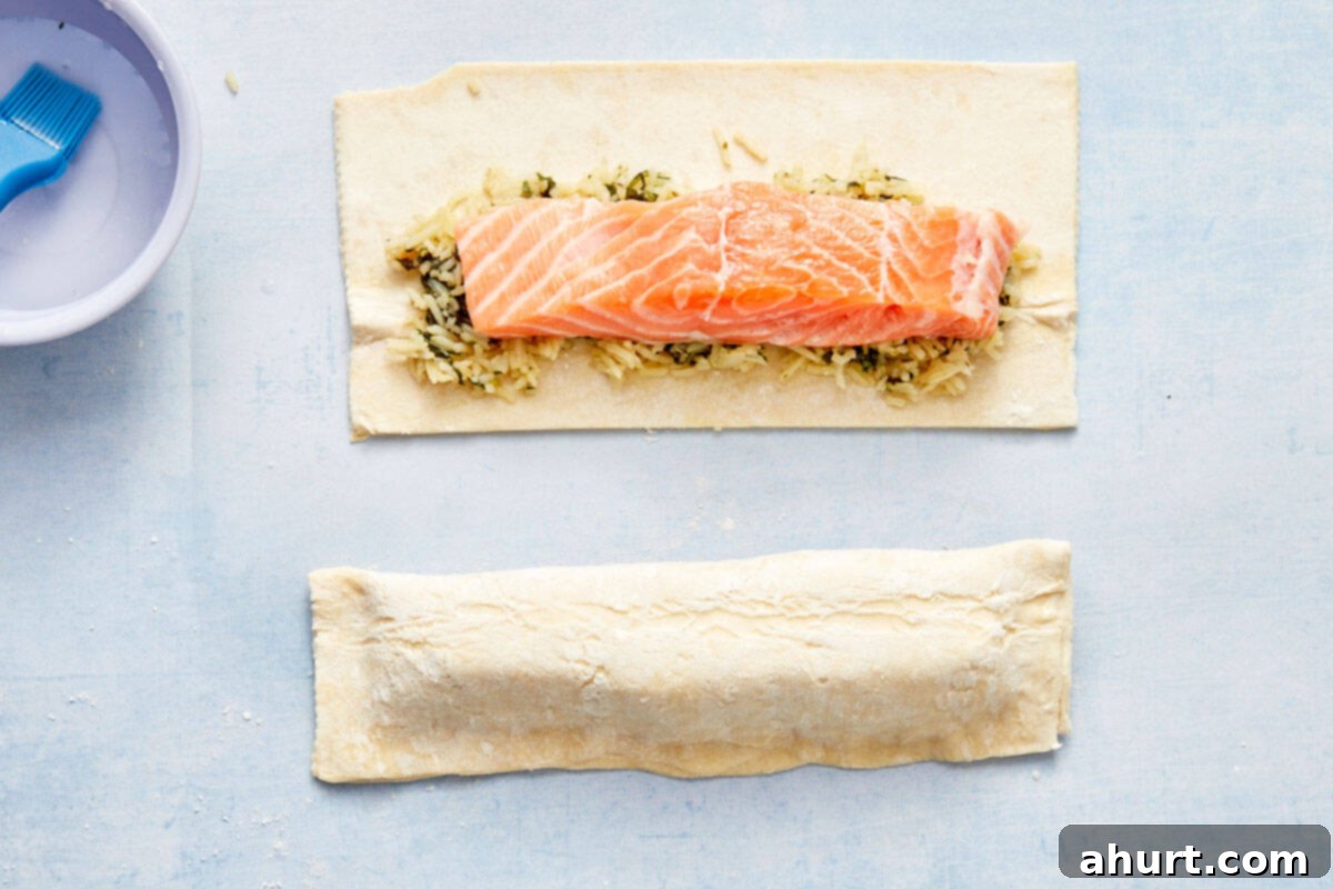 Flaky Salmon and Spinach Pockets 9 Salmon fillet placed over the spinach and rice mixture on pastry.