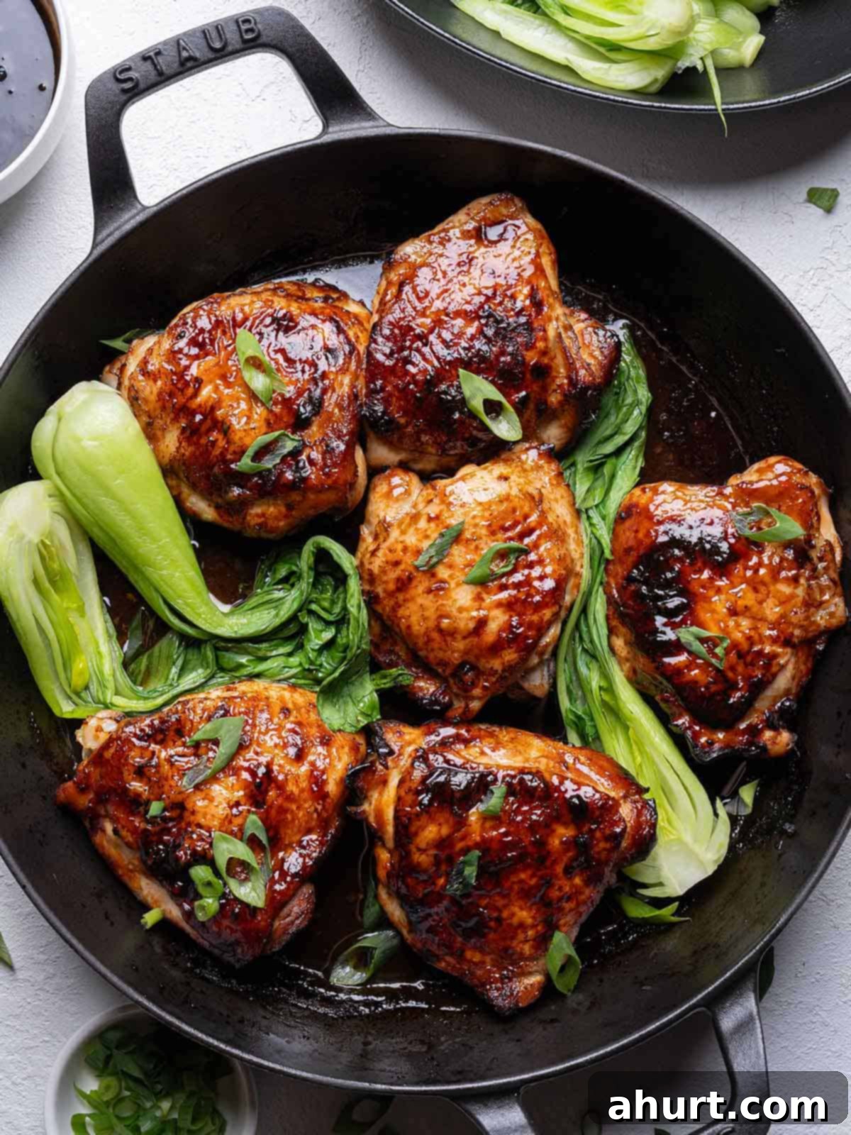 Caramelized Asian Glazed Chicken Thighs 2 Zoom in image of Roasted Asian Glazed Chicken Thighs, perfectly golden and glistening