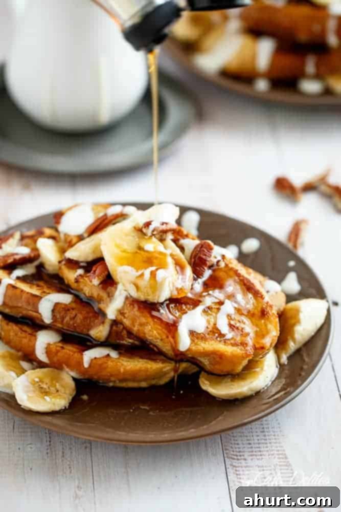 Cream Cheese drizzled over Banana Bread French Toast 