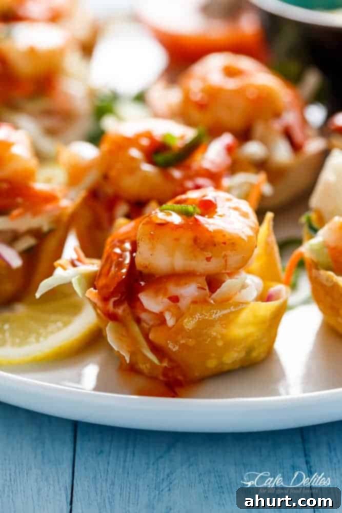 Garlic Prawn (Shrimp) Salad Wonton Cups with Sweet Chilli Sauce on a platter