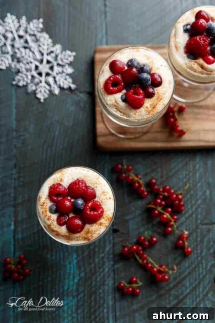 Effortless Eggnog Berry Cheesecakes 3 Top view of No Bake EggNog Berry Cheesecakes in a glass