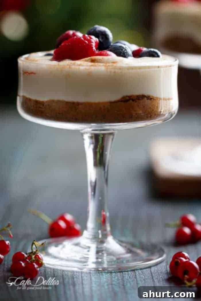 Effortless Eggnog Berry Cheesecakes 7 No Bake EggNog Berry Cheesecakes in a glass