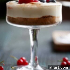 Effortless Eggnog Berry Cheesecakes 9 No Bake EggNog Berry Cheesecakes in a glass
