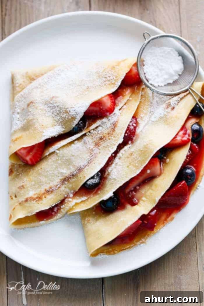 A stack of golden Blender Eggnog Crêpes, easy to make and perfect for a holiday breakfast