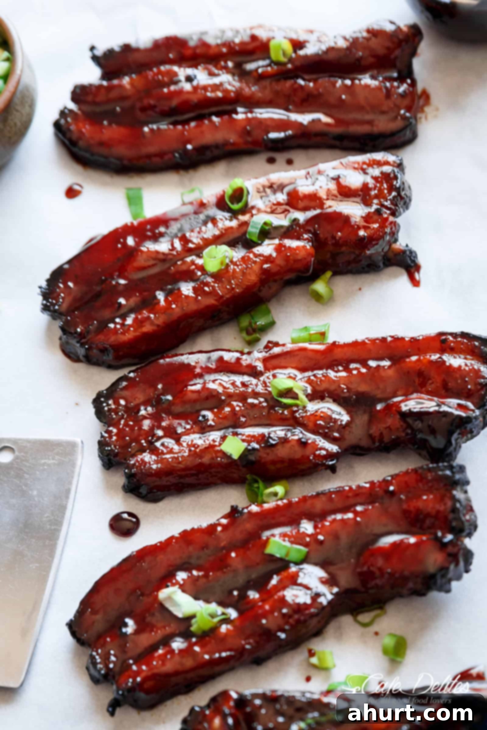 Glazed Char Siu Pork Belly 2 Sticky Chinese Barbecue Pork Belly (Char Siu) slices with a glossy glaze