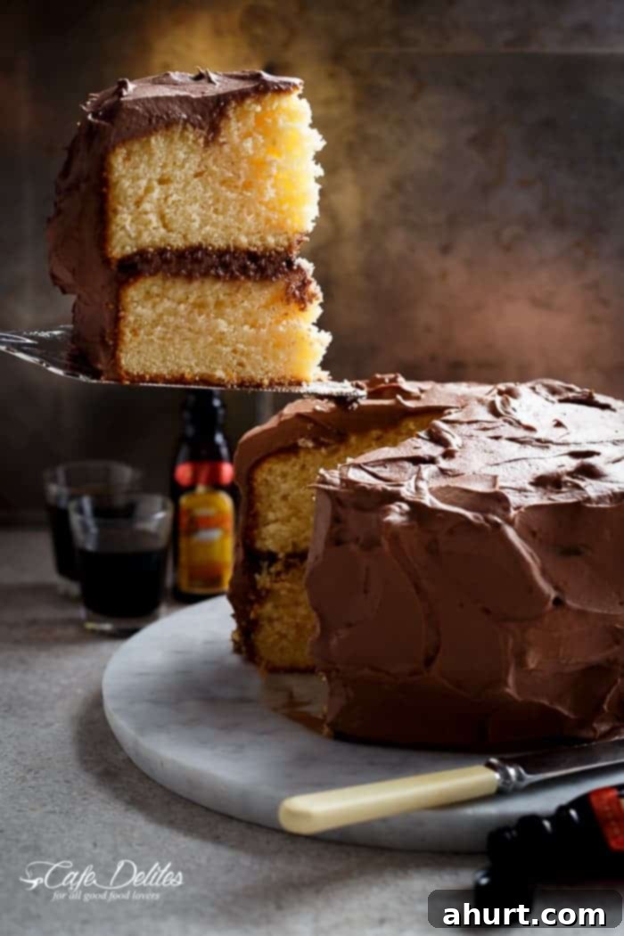 A slice of Kahlua Chocolate Cream Butter Cake, showcasing its rich frosting and tender crumb.