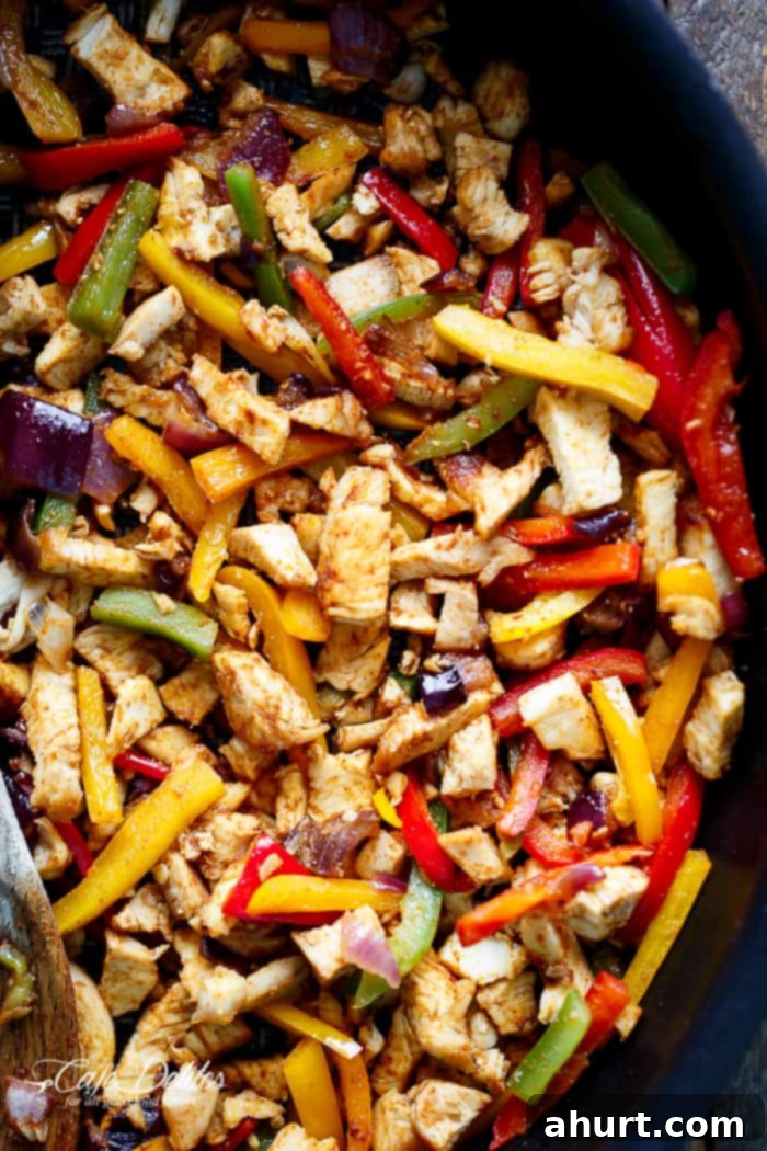 Twice Baked Chicken Fajita Sweet Potatoes in a pan 