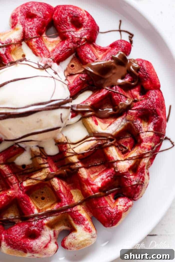 Top view image of Red Velvet Marbled Waffles with ice cream scoop