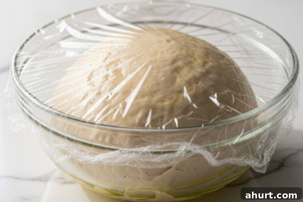 Simple Yeast-Free Flatbread Recipe 9 Place the dough in a lightly oiled bowl and cover with plastic wrap.