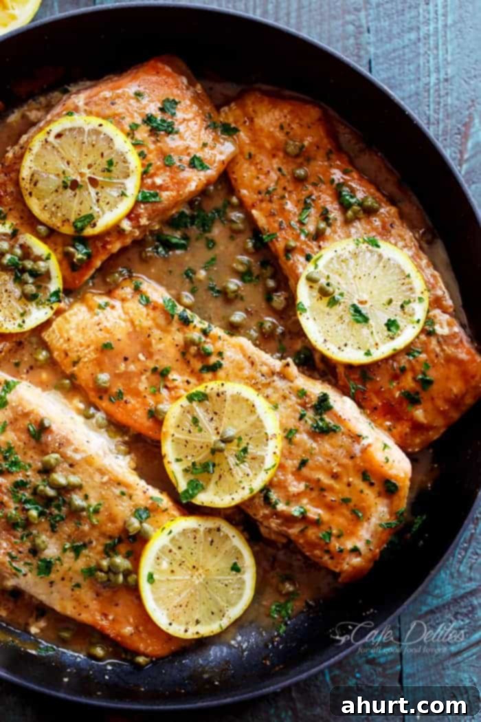 Quick Lemon Caper Salmon 2 Zoom in image of Easy Salmon Piccata with all of the authentic Piccata flavours of white wine, capers, lemon and garlic.