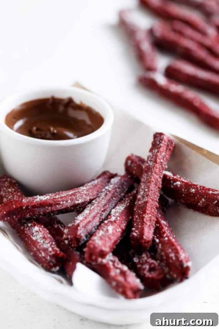 Side view of The Best Red Velvet Churros with dip