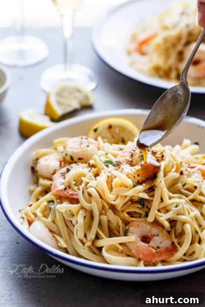 Nutty Browned Butter Shrimp Scampi 3 Black sauce dripping over Browned Butter Shrimp Scampi