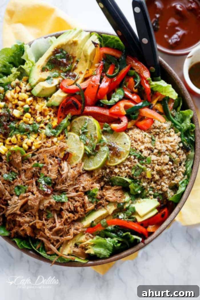 Chipotle Lime Carnitas Salad presented in a serving pan, showcasing its vibrant ingredients and appealing texture.
